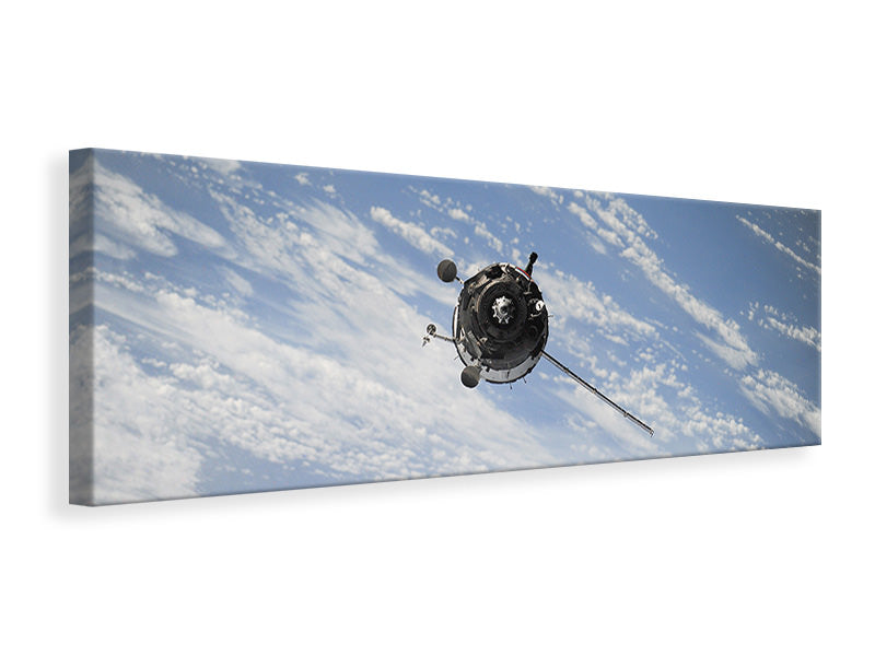 panoramic-canvas-print-a-satellite-above-the-clouds